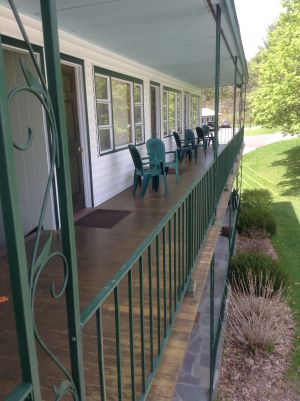 Outdoor seating area of the Pool Motel room group